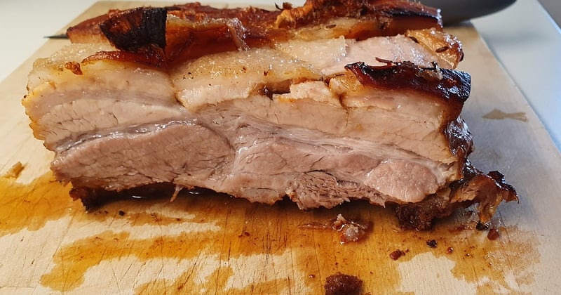 Cuisson rôti de porc au four : le secret d'une viande fondante